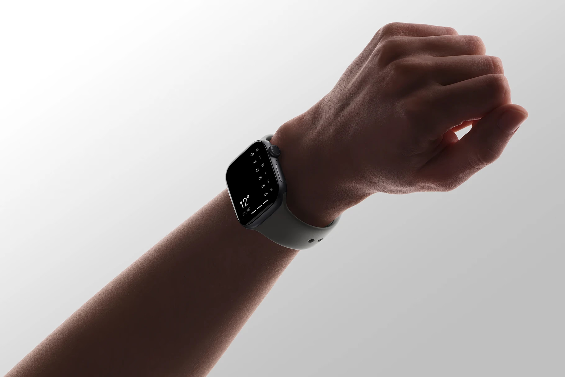 Apple Watch を着けた手首